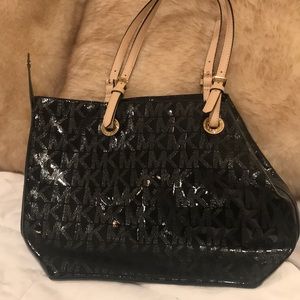 Michael Kors black tote bag.